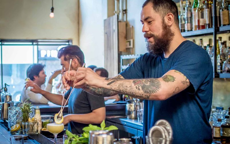 "Bartender Hector Valencia garnishes a cocktail at Alembic in San Francisco, Calif., on September 5th, 2015."